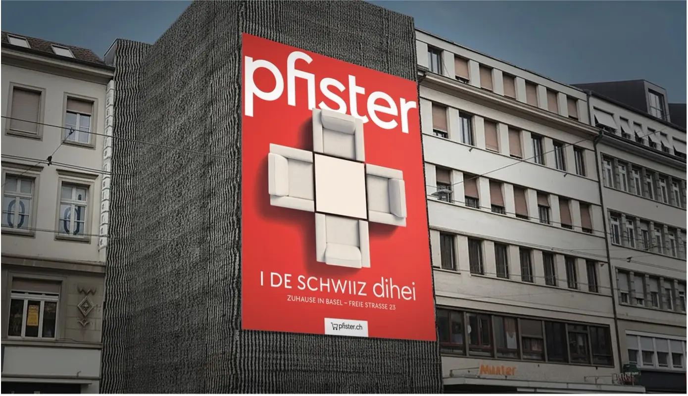 Ein großes rotes Plakat von Pfister mit der neuen Dachmarkenkampagne 
